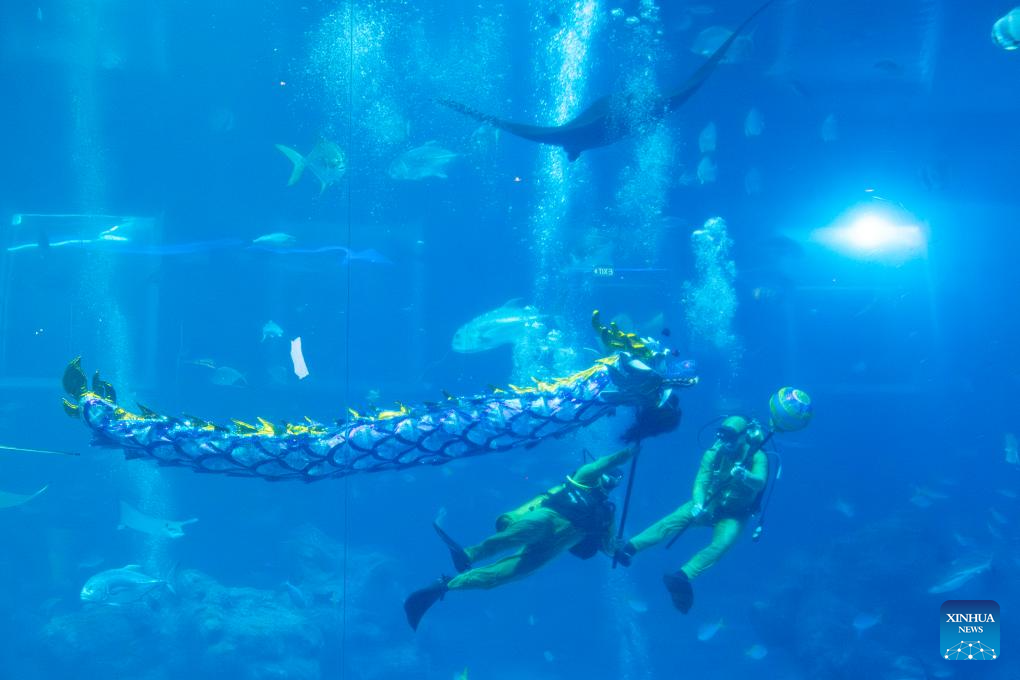 Underwater dragon dance performed to celebrate upcoming Chinese Lunar New Year in Singapore